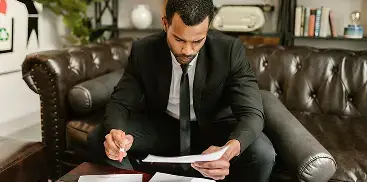 Consultant reviewing paperwork