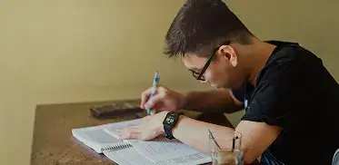Student studying at a desk